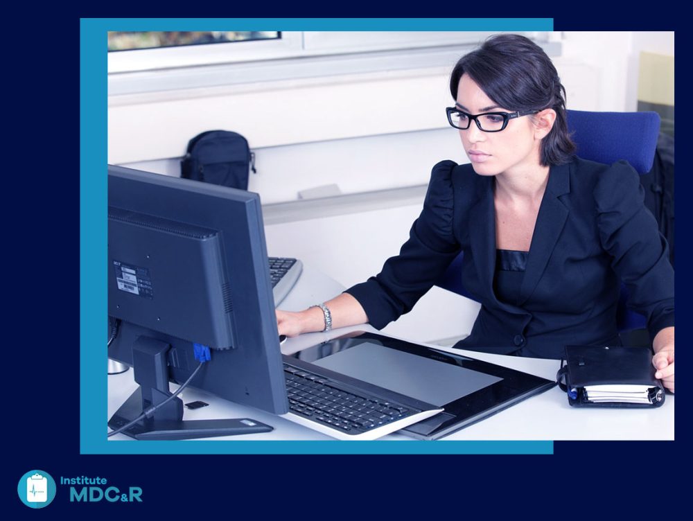 Business woman working in QMS software